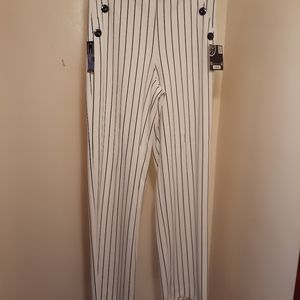 White and black pinstripe pants.